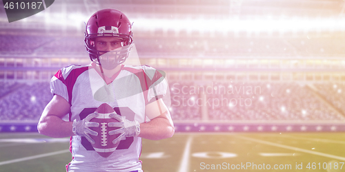 Image of American Football Player isolated on big modern stadium field