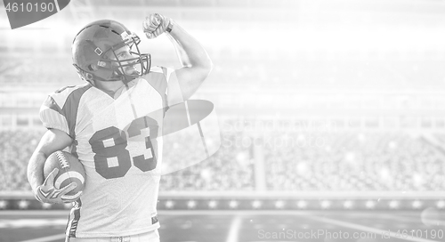 Image of american football player celebrating touchdown