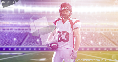 Image of American Football Player isolated on big modern stadium field