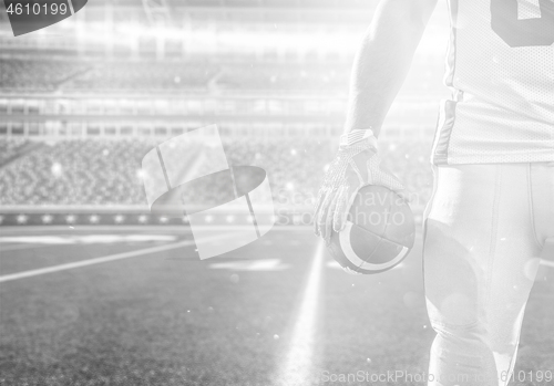 Image of closeup American Football Player isolated on big modern stadium