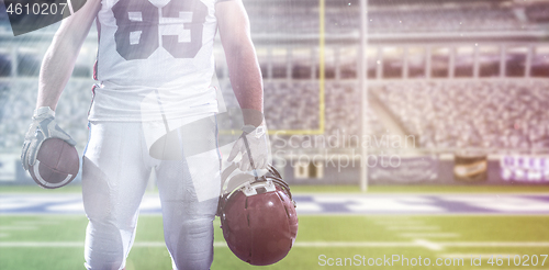 Image of closeup American Football Player isolated on big modern stadium