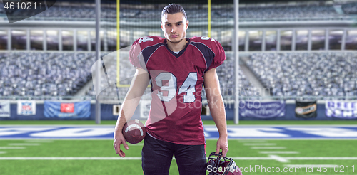 Image of American Football Player isolated on big modern stadium field