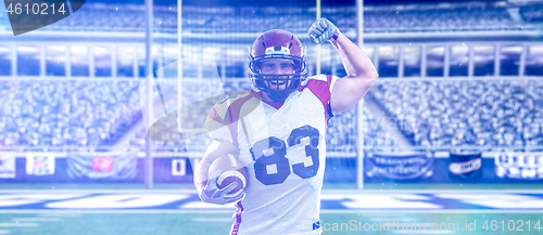 Image of american football player celebrating touchdown