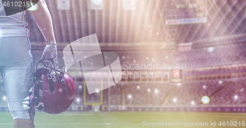 Image of closeup American Football Player isolated on big modern stadium