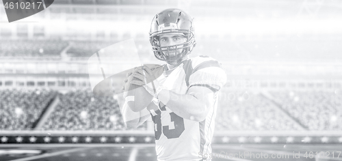 Image of american football player throwing ball