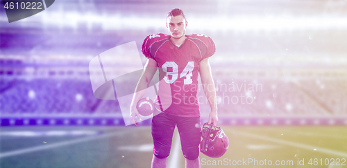 Image of American Football Player isolated on big modern stadium field