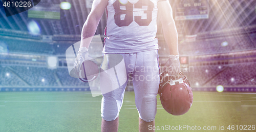 Image of closeup American Football Player isolated on big modern stadium