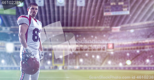 Image of American Football Player isolated on big modern stadium field