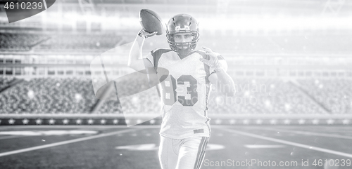 Image of american football player throwing ball