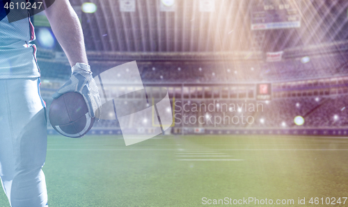 Image of closeup American Football Player isolated on big modern stadium