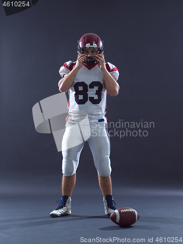 Image of American Football Player isolated on gray