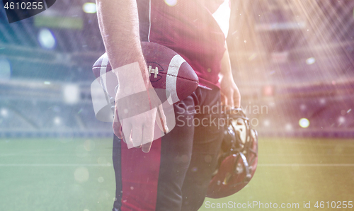 Image of closeup American Football Player isolated on big modern stadium