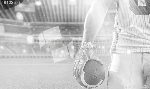 Image of closeup American Football Player isolated on big modern stadium