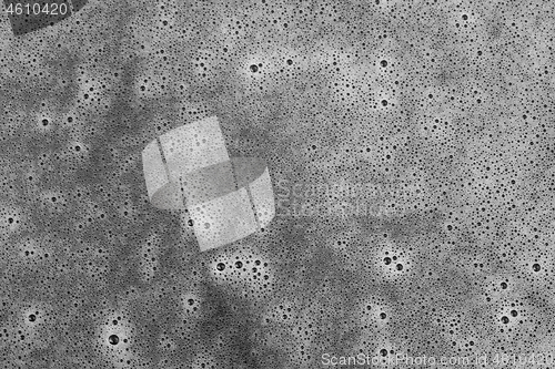 Image of Detail of a water surface with bubbles