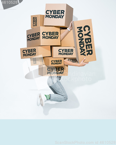 Image of Gift boxes in the hands of young man