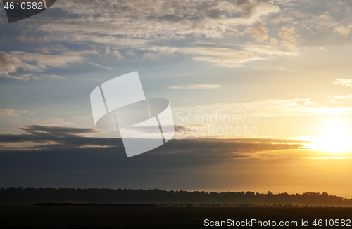 Image of fog and stacks of straw