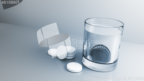 Image of glass of water with some tablets