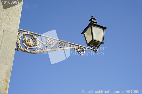 Image of vintage street lamp on a house in Stockholm Sweden