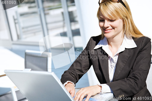Image of Working caucasian businesswoman