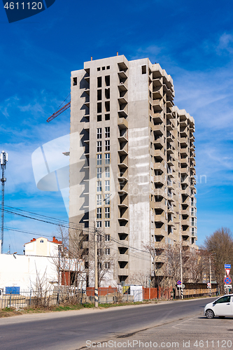 Image of Abandoned and unfinished construction of a multi-storey residential building