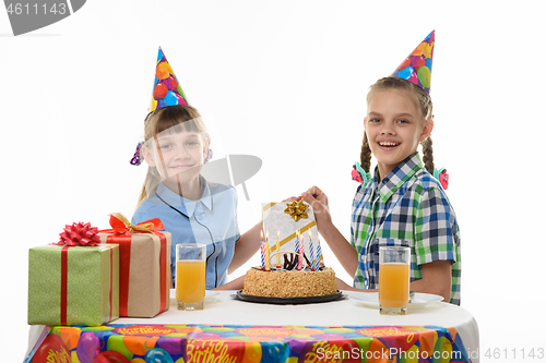 Image of Girlfriend gives a birthday girl a gift