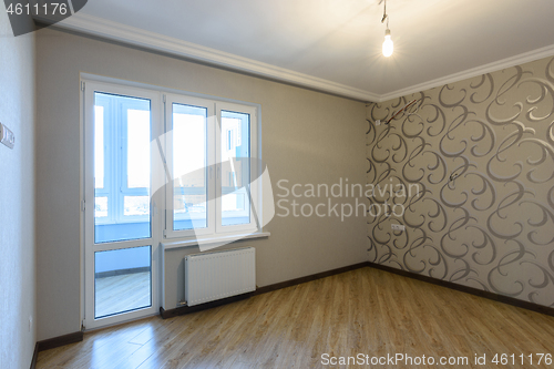 Image of Exit to a glazed loggia in the interior of an empty room