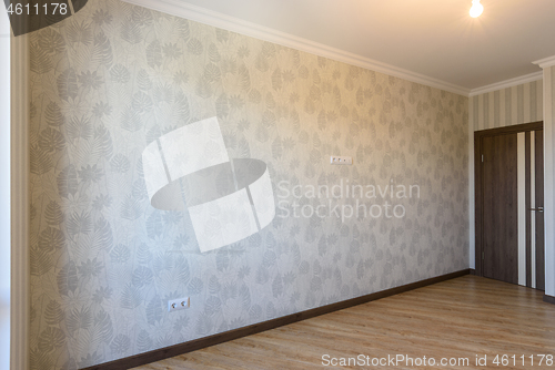 Image of Wall and door in the interior of an empty bedroom