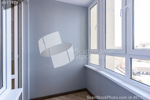 Image of interior of a small glazed loggia after renovation