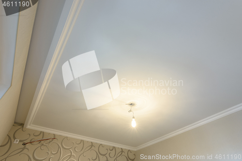 Image of Plastered ceiling with a dedicated spot for curtains