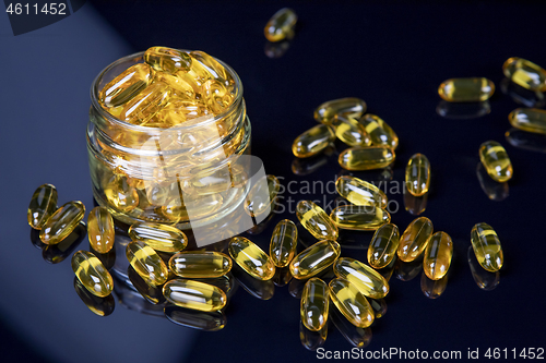 Image of Omega Fish Oil Dietary Supplement In Jar