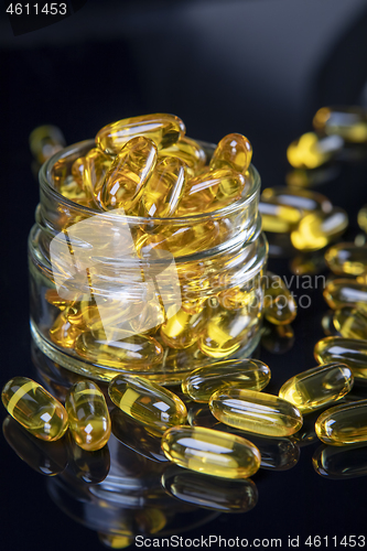 Image of Omega Fish Oil Dietary Supplement In Jar