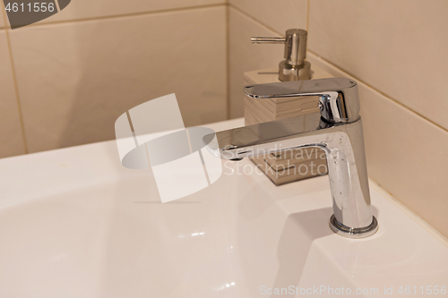 Image of Bathroom interior with sink and faucet