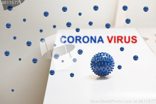 Image of Shot of microscope virus close up. Coronavirus concept Tablet in the fingers of hand