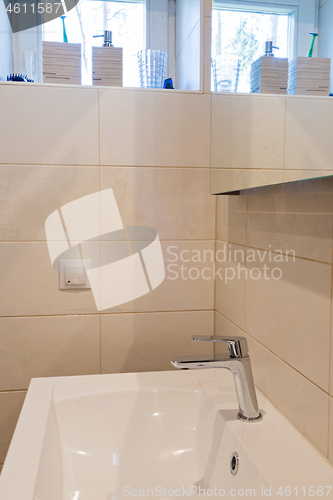 Image of Bathroom interior with sink and faucet