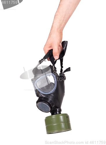 Image of Man holding vintage gasmask isolated on white - Green filter