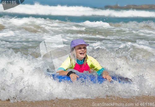 Image of girl in the waves