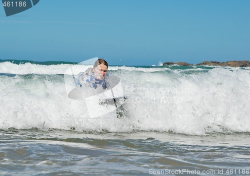 Image of girl in the waves