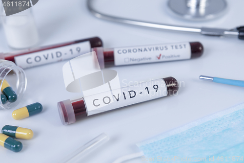 Image of Blood test tube with COVID 19 Coronavirus disease for virus test