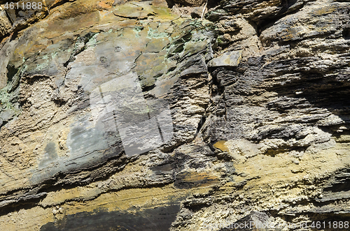 Image of Background of weathered natural schist rock