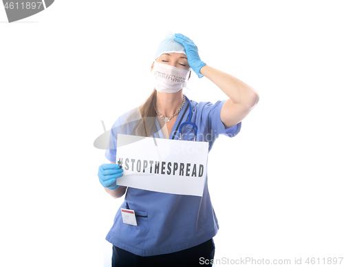 Image of Overwhelmed nurse pleading to stop the spread of virus