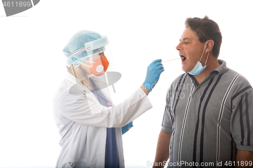 Image of Healthcare worker swabbing a patient for respiratory viruses COV