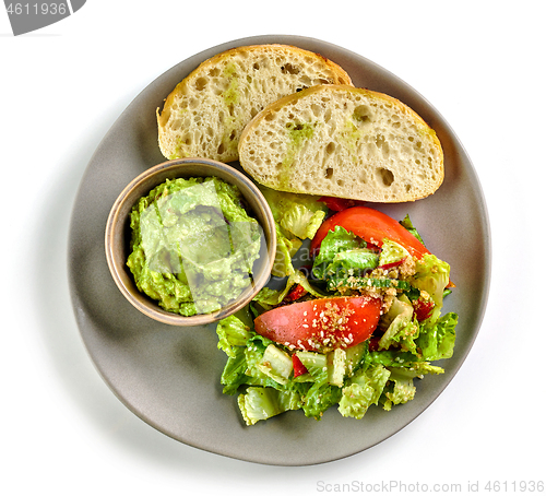 Image of plate of salad and guacamole