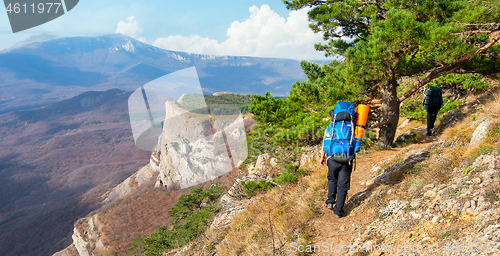 Image of The tourist in mountains