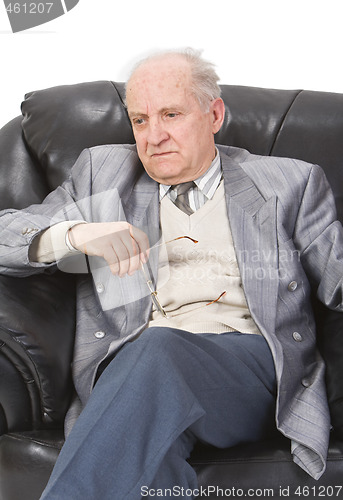 Image of Thoughtful senior man