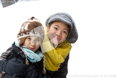 Image of Girl playing in the snow in winter in denmark