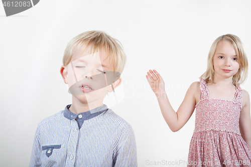 Image of Portrait of a brother and sister in studio