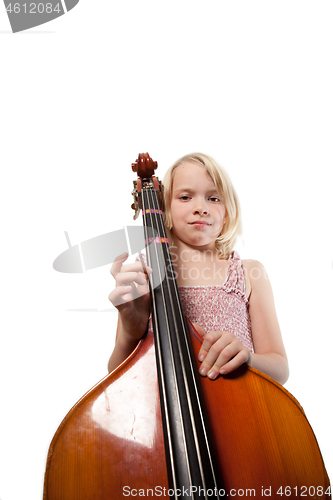 Image of Portrait of a young teenager girl in studio with a cello