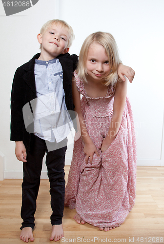 Image of Portrait of a brother and sister in studio