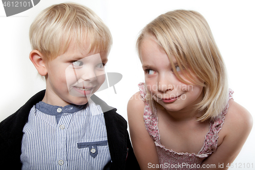 Image of Portrait of a brother and sister in studio