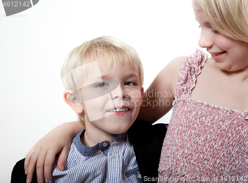 Image of Portrait of a brother and sister in studio